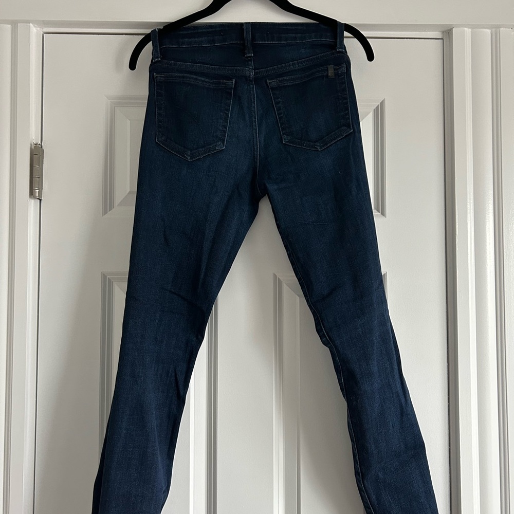 Joe’s dark blue jeans